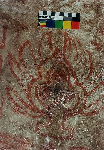 pictograph of three flaming jewels